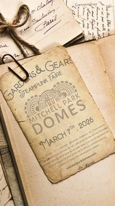 A well-worn card advertises the Gardens and Gears Steampunk Faire at the Mitchell Park Domes in Milwaukee Wisconsin USA on March 7, 2026.